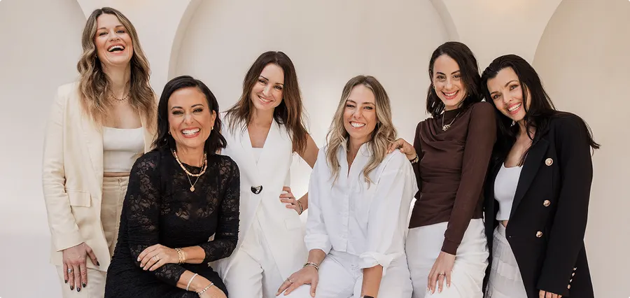 The SHE-com coaching team